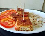 A picture of step 12 of Cheese Tomato Sandwich Bites.