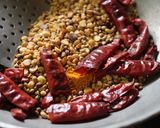 A picture of step 3 of Andhra Style Gutti Vankaya Pulusu Koora /Stuffed Brinjal Gravy Curry.