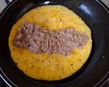 Foto del paso 3 de la receta: Omelette de frijoles con queso