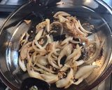 A picture of step 1 of Oven-Baked Duck Confit with Roasted Garlic, Onion, and Parsley.