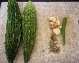 A picture of step 1 of Crispy Karela Chips.