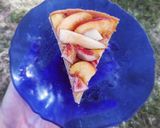Une image de l'étape 4 de Tarte amandine et pralin aux pêches et brugnons.