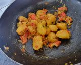 A picture of step 3 of Aloo palakh.