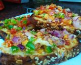 A picture of step 5 of Homemade multigrain bread sooji pizza.