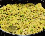 A picture of step 4 of Soya granules with potato and fresh green peas.