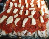 Foto del paso 3 de la receta: Filet de merluza a la pizza