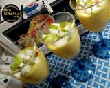A picture of step 3 of Mango lassi with green apple.