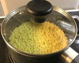 A picture of step 2 of Curry millet grain with black beans and sweet corn.