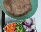 A picture of step 1 of Teragon steaks with garlic rice and vegs.