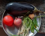 A picture of step 1 of Baigan Bharta/ Ringna No Olo sabzi.