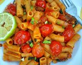 A picture of step 2 of Basil penne pasta in hot tomato sauce.
