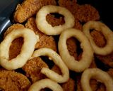 A picture of step 1 of Southern fried Chicken Dippers, Onion rings + BBQ Beans 😋.