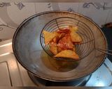 A picture of step 7 of Peri Peri Nachos.