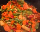 A picture of step 7 of Creamy Chicken and Vegetable Paella.