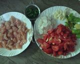 A picture of step 1 of Boneless Chicken and Tomatoes Karahi.