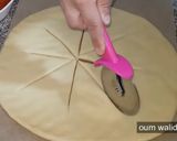 Une image de l'étape 3 de Pizza revisitée avec une pâte moelleuse.