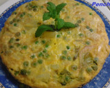 Foto del paso 7 de la receta: Tortilla de guisantes, cebolletas tiernas, y patatas a la hierbabuena