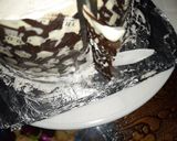 A picture of step 7 of Polka Dot Chocolate Icing cake.