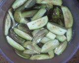 A picture of step 1 of Brinjal fry in Garlic Masala.