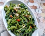 Foto langkah ke 6 dari resep Oseng kangkung saus tiram.