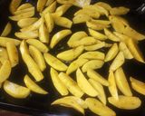 A picture of step 3 of Baked Potatoes wedges.