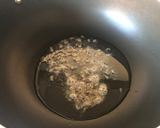 A picture of step 2 of Carrot Rice.