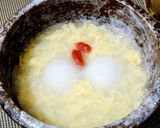 A picture of step 7 of Sweet Rice Wine Sesame Dumplings.