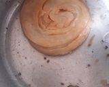 A picture of step 5 of Satpura (Deep fried dessert).