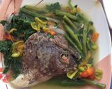 A picture of step 7 of Dinengdeng with fried fish.
