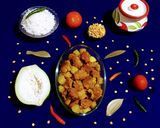 A picture of step 7 of Papaya and Fritters Curry.