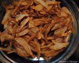 A picture of step 10 of Crispy brown onions.