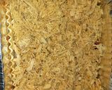 Foto del paso 4 de la receta: Lasaña de pollo desmenuzado