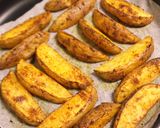 A picture of step 4 of Spicy Baked Potato Wedges.