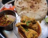 A picture of step 7 of Kolhapuri Chickan masala and curry.