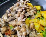 A picture of step 6 of Paddy Straw Mushroom And Peas Curry.