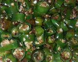 A picture of step 1 of Fry Green Chili.