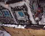 Foto del paso 4 de la receta: Mi casita de jengibre, chocolate y glasé!!🏠🎄🎄🎇