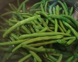 A picture of step 1 of Sautéed Green Beans with Tomatoes 🍅.