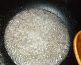 A picture of step 2 of Simple salted caramel sauce.