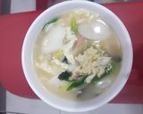 Foto langkah ke 6 dari resep Tteok Mandu Guk (떡만두국) Soup Korea.