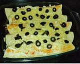 A picture of step 10 of Cheesy Mexican Chicken Fajita Wraps.