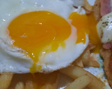 Foto del paso 8 de la receta: Milanesa a la napolitana con papas fritas y huevo