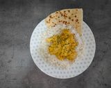 A picture of step 6 of Madras Chicken with Naan Bread.