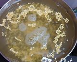A picture of step 1 of Sun dried Moong Badi with Amaranthus Greens.