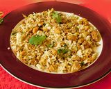 A picture of step 7 of Banana masala powder (Podimas in Tamil) mixed with rice.