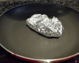 Foto del paso 2 de la receta Merluza al papillote en sartén