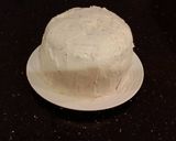 A picture of step 24 of Vanilla Lemon Raspberry Layer Cake with Whipped Cream Buttercream Frosting.