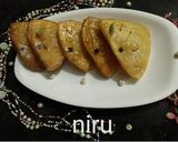 A picture of step 12 of Badam puri.