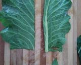 A picture of step 2 of Dirty rice collard rollups.