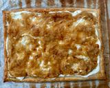 A picture of step 9 of Goat Cheese and Caramelized Onion Tart.